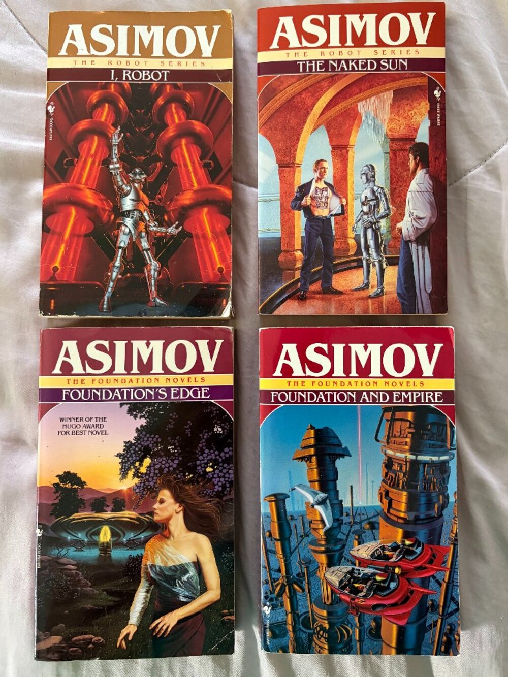 Issac Asimov Novel Paperbacks.  ( 2) Robot Series and (2) Foundation Series